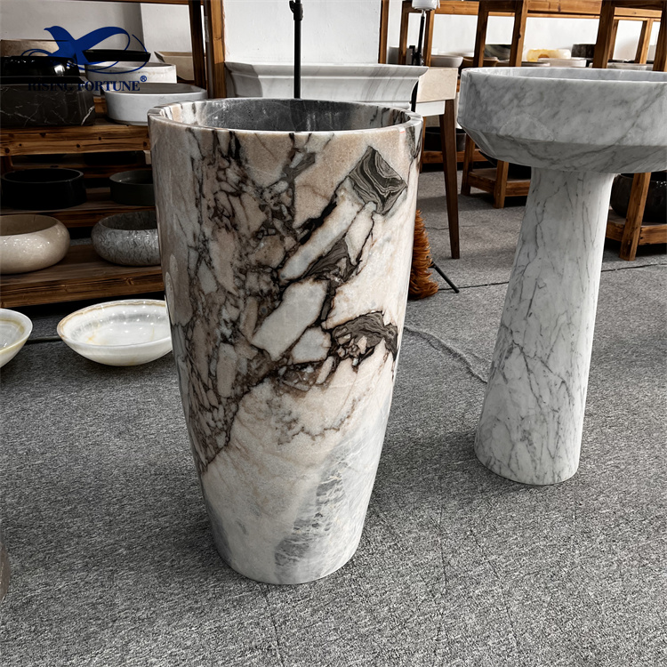 white marble wash hand basin with pedestal