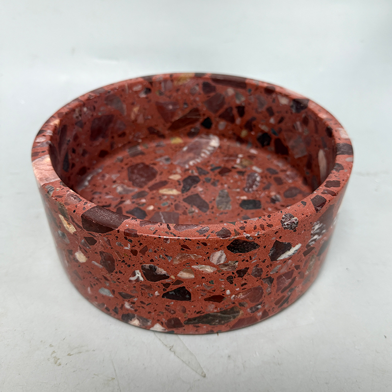 Red dog food and water bowls