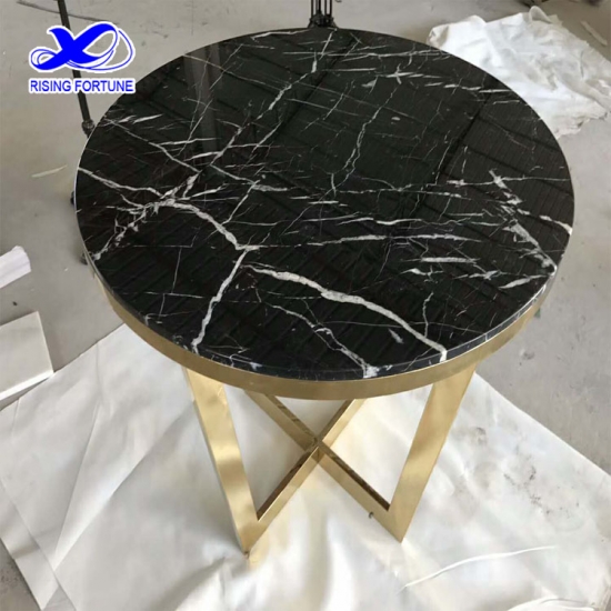 table basse ronde en marbre avec pied en métal