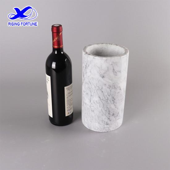 refroidisseur à vin seau à glace en marbre blanc et noir

